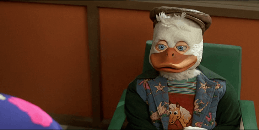 A scene from Howard the Duck features the duck in human clothes