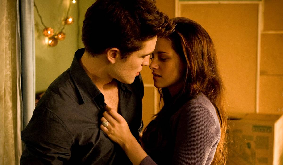 Kristen Stewart as Bella Swan and Robert Pattinson as Edward Cullen in the twilight fantasy franchise