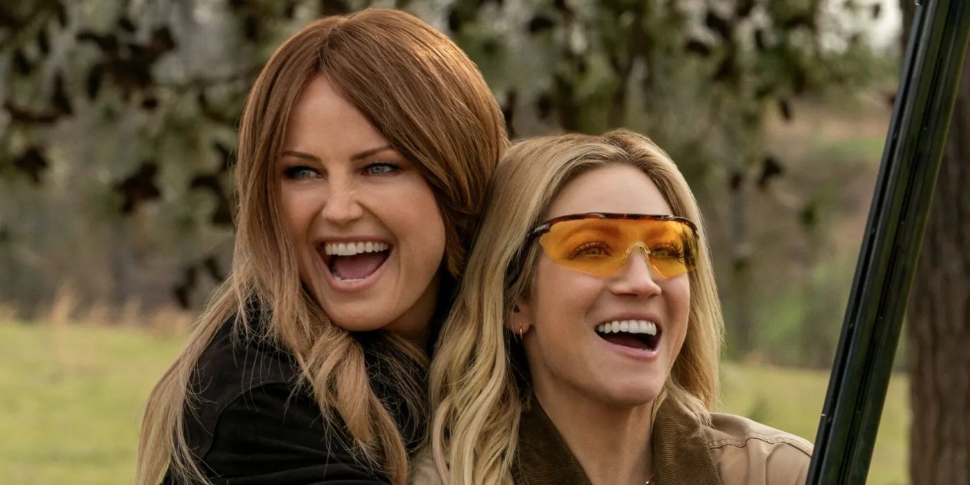 the-hunting-wives-brittany-snow-malin-akerman-hugging-smiling