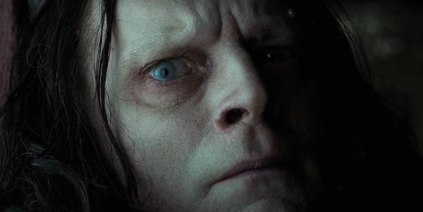 A closeup of Gríma Wormtongue looking at Éowyn in The Lord of the Rings: The Two Towers
