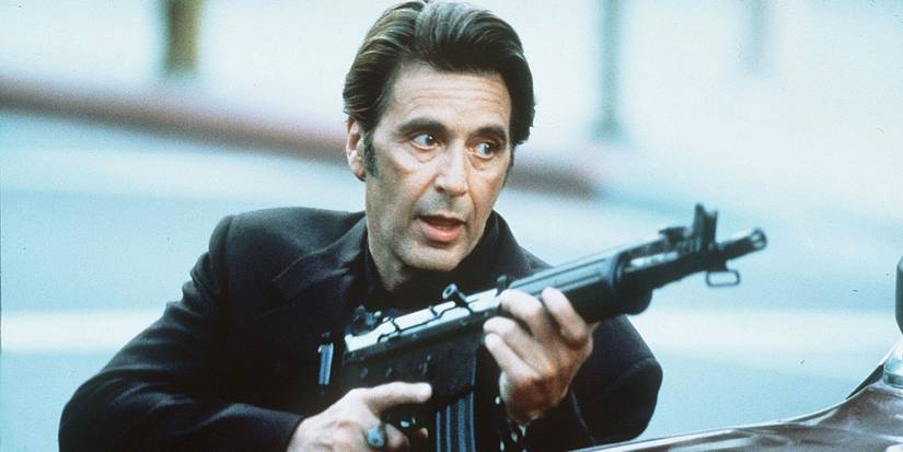 Lt. Vincent Hanna holds an automatic rifle in a shootout in Heat