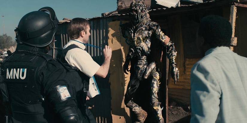 Wikus interviews a citizen of District 9 in District 9.