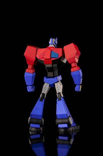 Model Transformers Furai dari Flame Toys: Kit model Optimus Prime yang dianimasikan dari belakang.