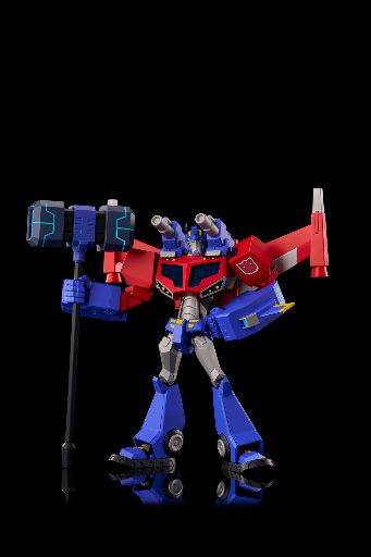 Model Furai Transformers dari Flame Toys: Kit model Optimus Prime Wingblade yang dianimasikan memegang palu Ultra Magnus.