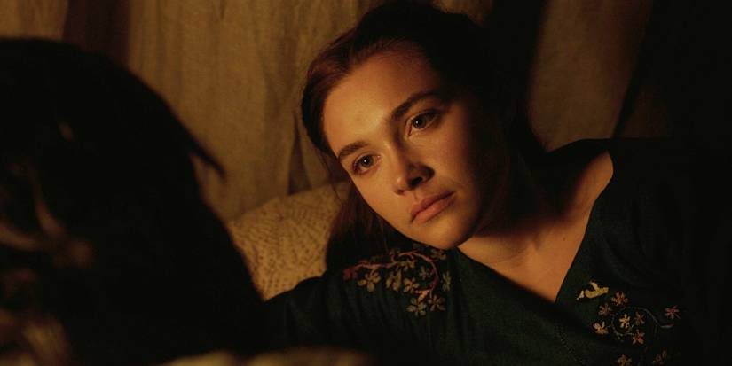 Elizabeth habla con Robert en la cama en Outlaw King 2018