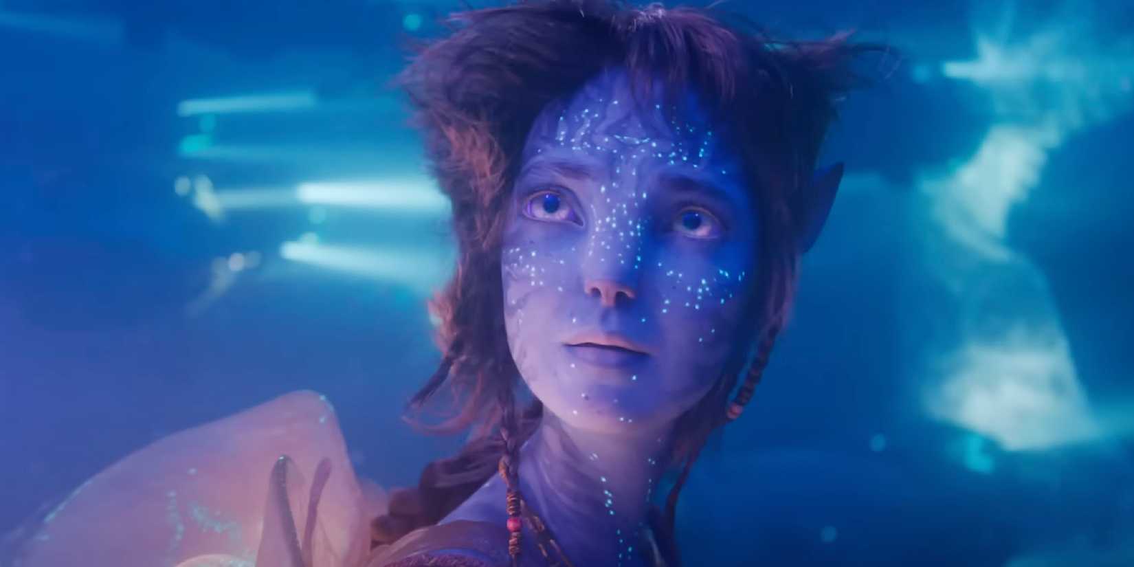 Kiri looks up from the water in Avatar Fire and Ash