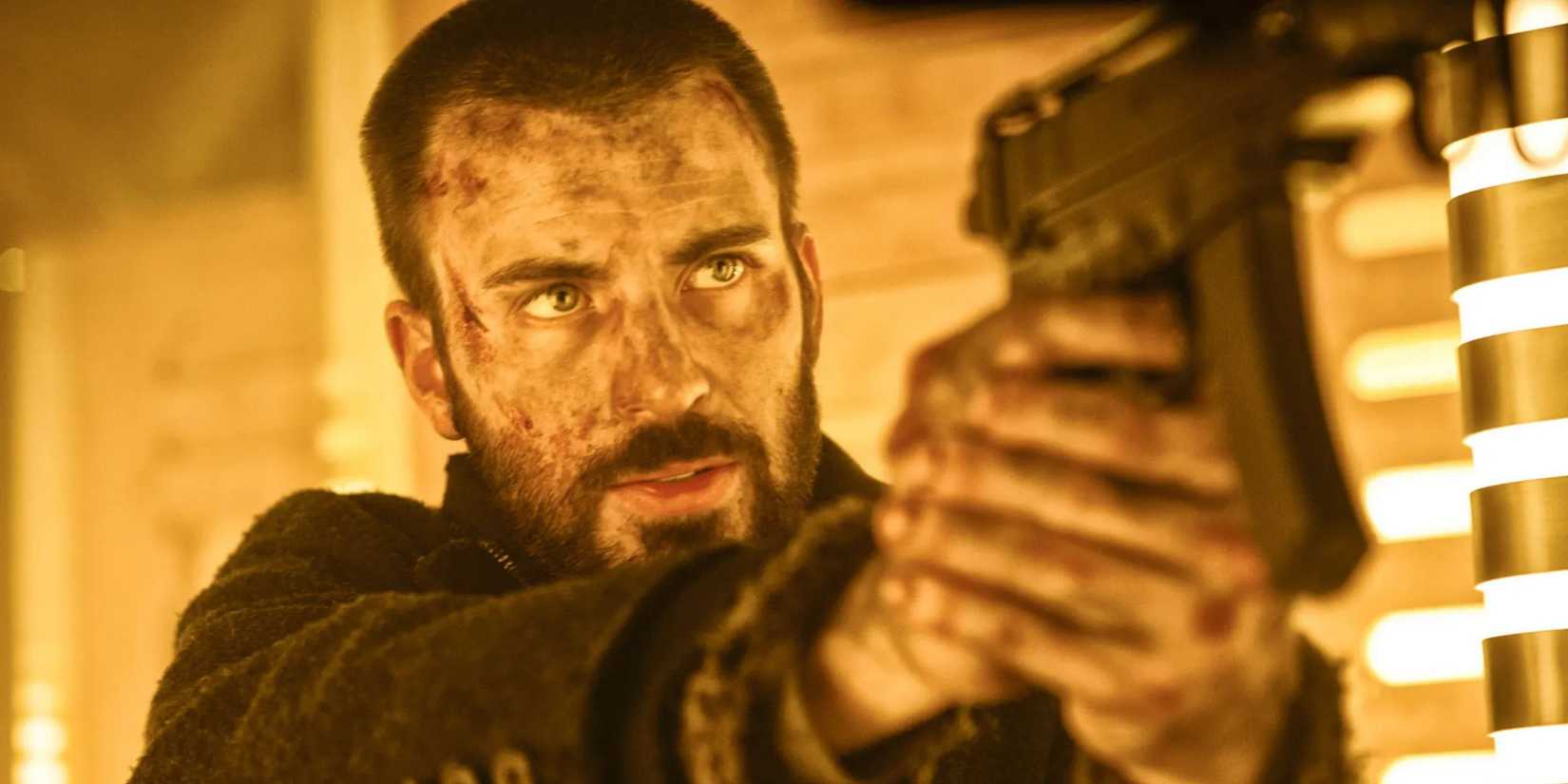 Chris Evans holding a gun as Curtis in Snowpiercer