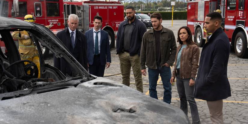 Team Armor investigating a burned out truck in Countdown 'Your People Are in Danger'