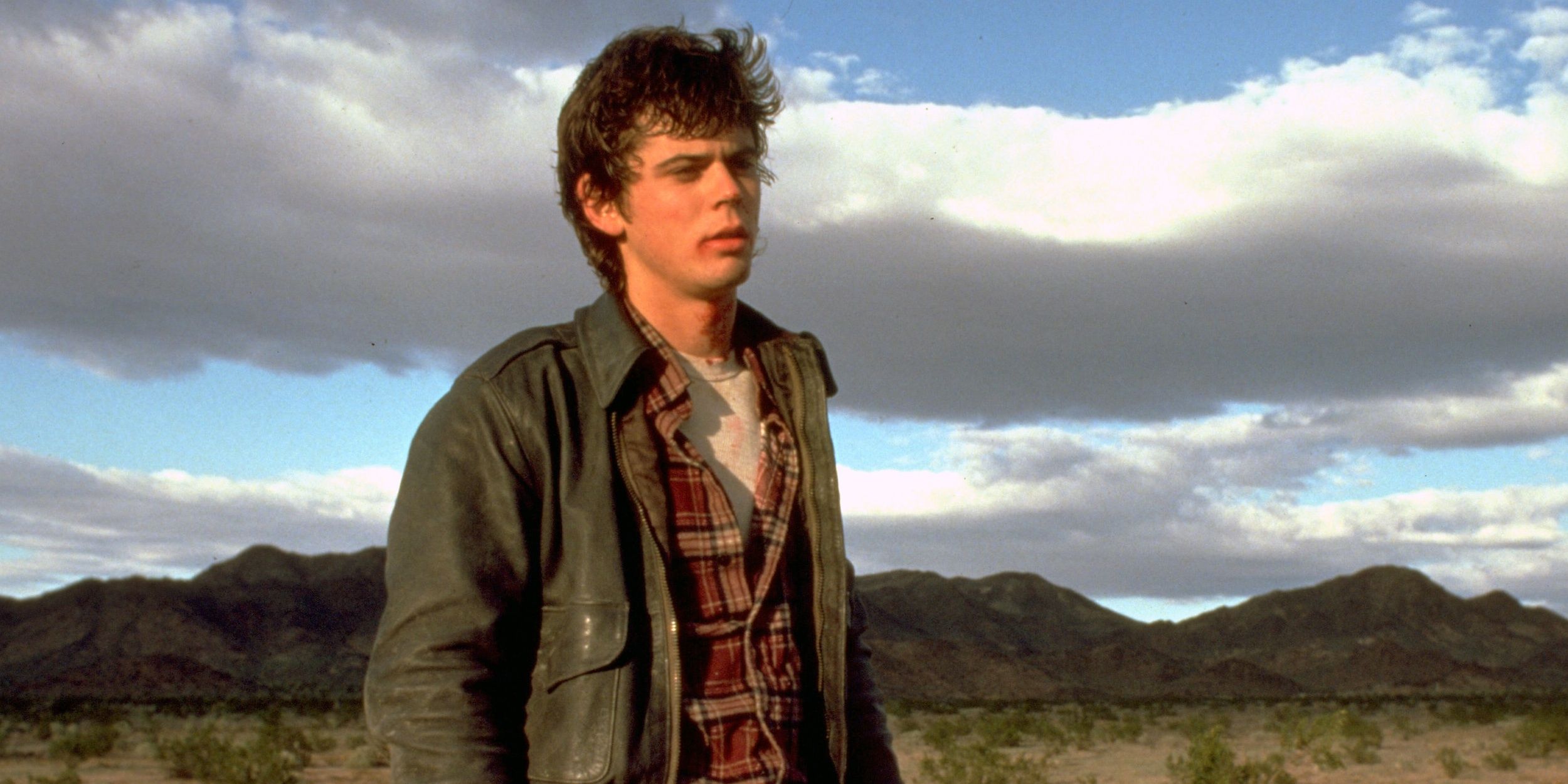 Jim from The hitcher standing outside