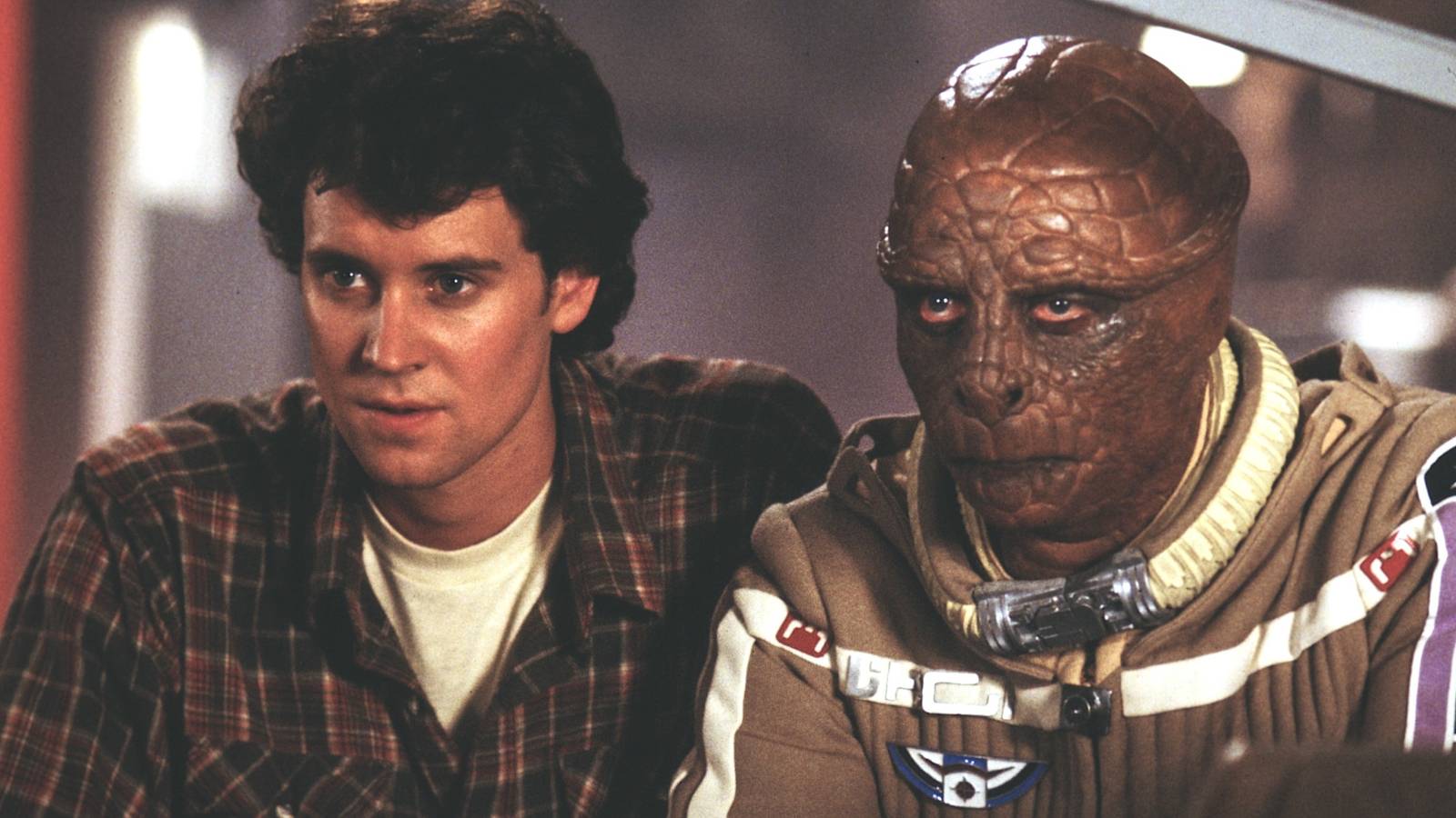 Lance Guest as Alex Rogan and Dan O'Herlihy as Grig in The Last Starfighter