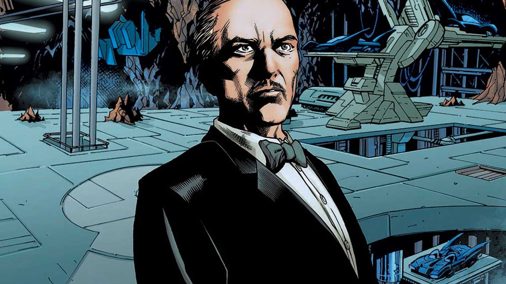 Alfred Pennyworth standing in the Batcave