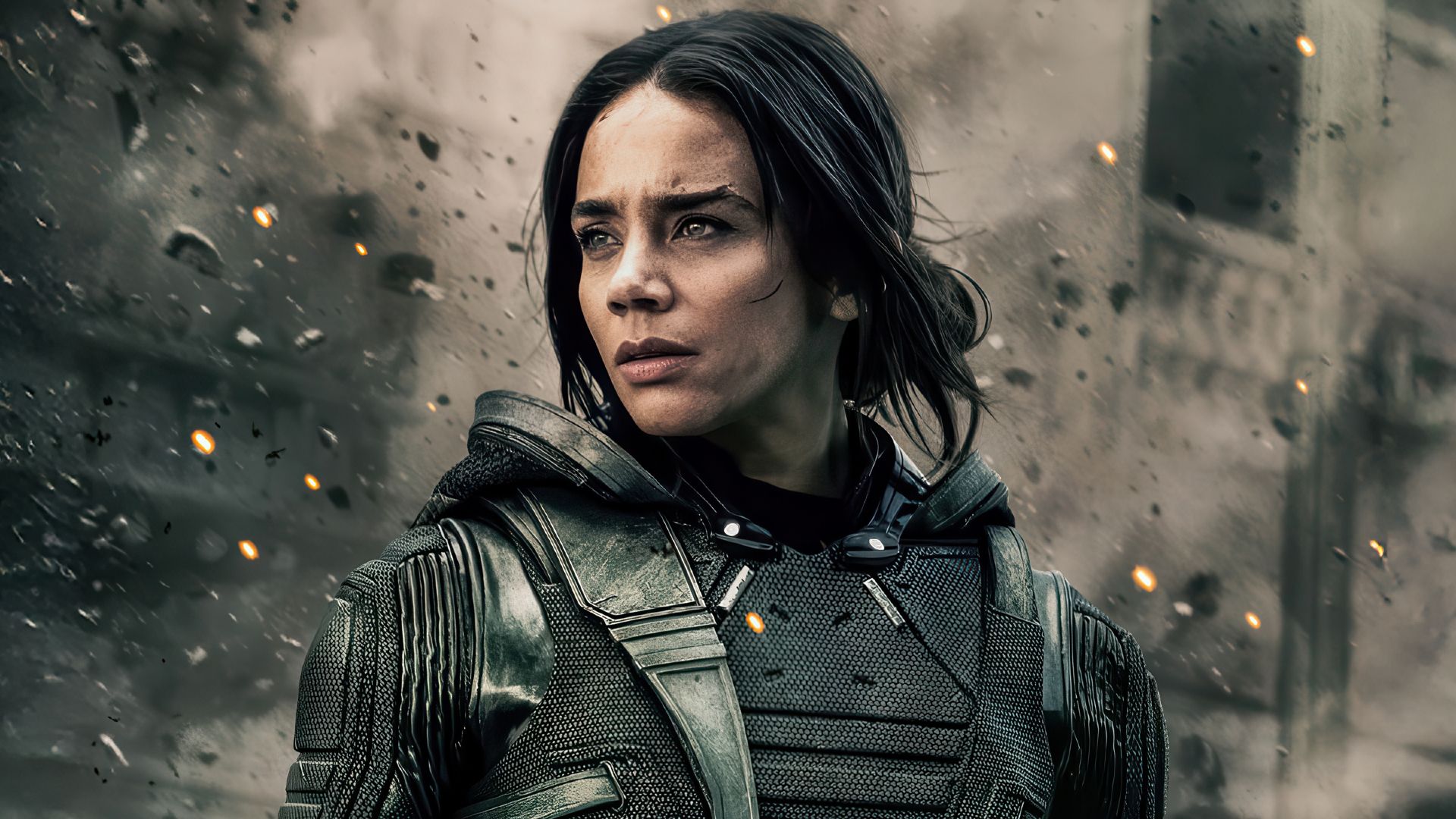 Ava Starr Ghost looks to the distance as rubble falls around her in Thunderbolts*