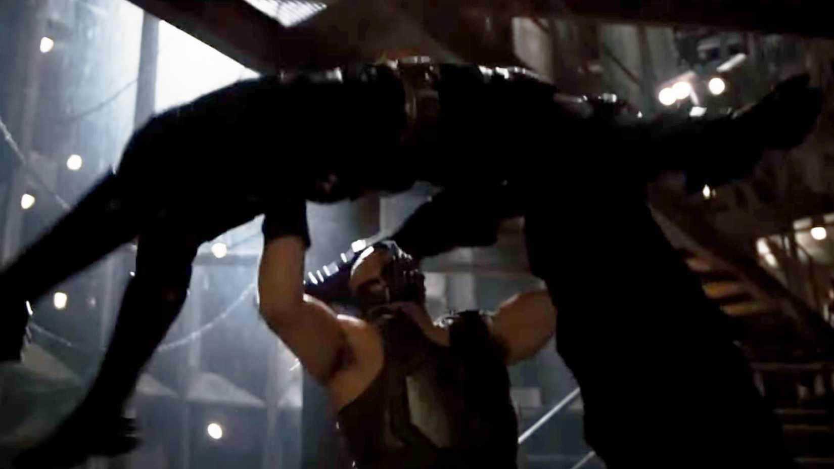 Bane lifting up Batman in The Dark Knight Rises