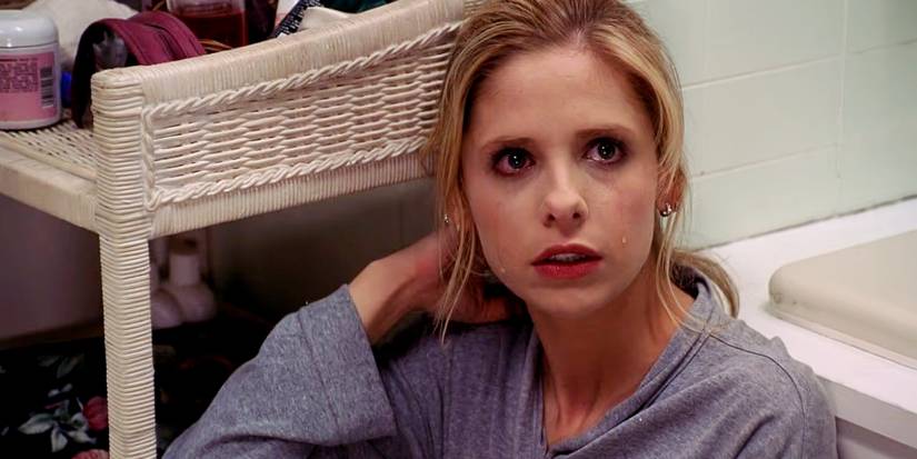 Buffy sits on the ground and cries after Spike's attack. Buffy the Vampire Slayer sees red