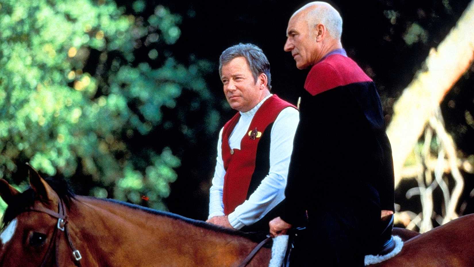 Captain Kirk and Picard in uniform on horseback from Star Trek Generations