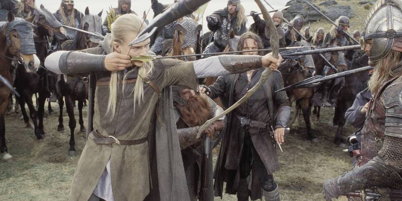 Legolas and Gimli shoot arrows in The Lord of the Rings: The Two Towers