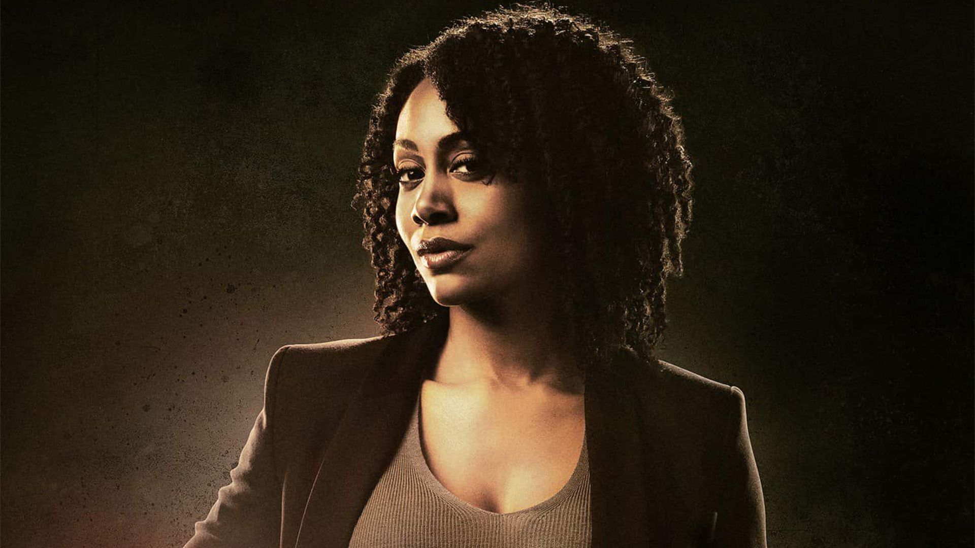 Misty Knight on a stylized background looks at the viewer in Luke Cage poster