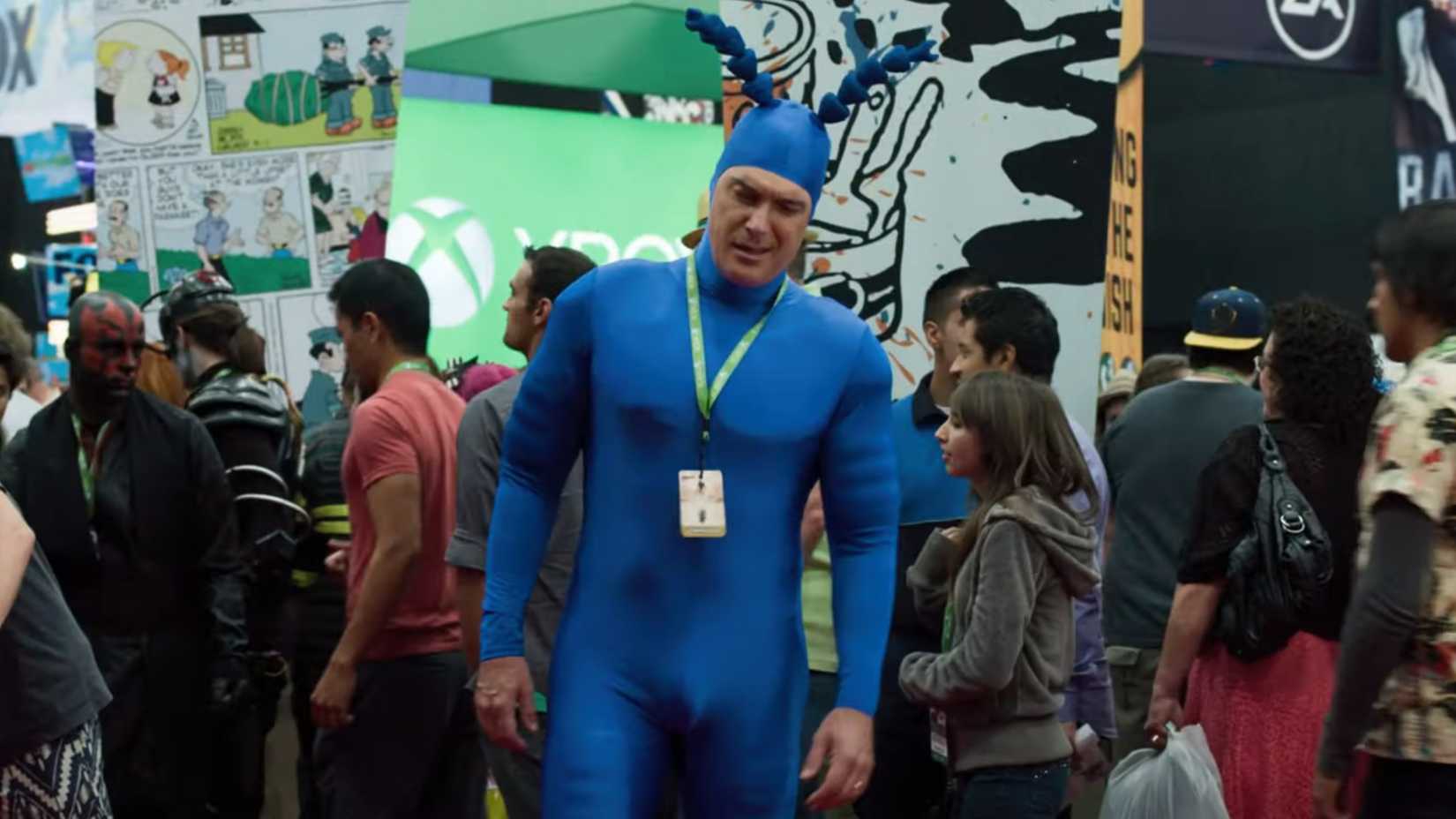 Patrick Warburton plays the guy who plays Tic at NYCC in Ted 2
