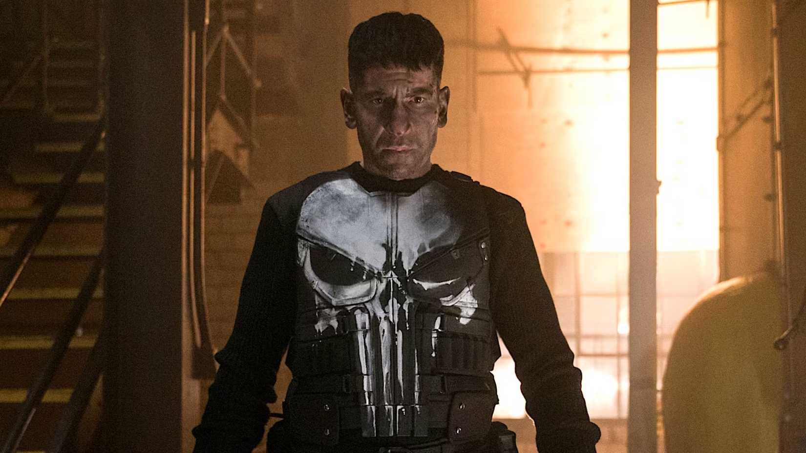 The Punisher looks stoic while wearing his iconic vest