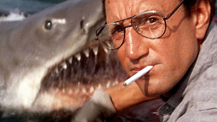 Roy Scheider as Brody with the shark behind him in Jaws