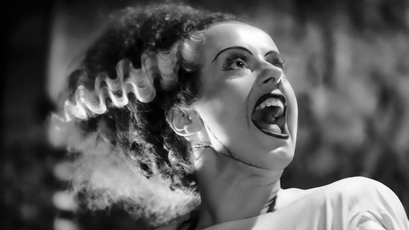 The Bride of Frankenstein screams in horror