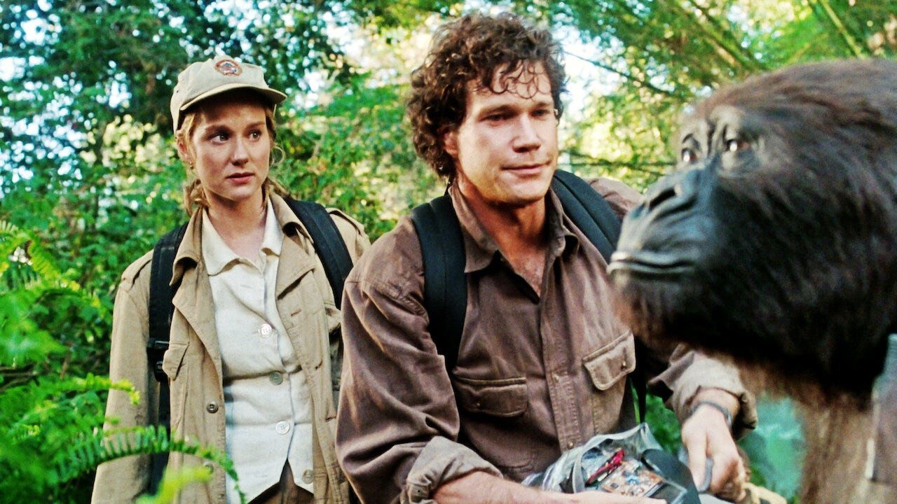 Dylan Walsh and Laura Linney next to a gorilla in Congo