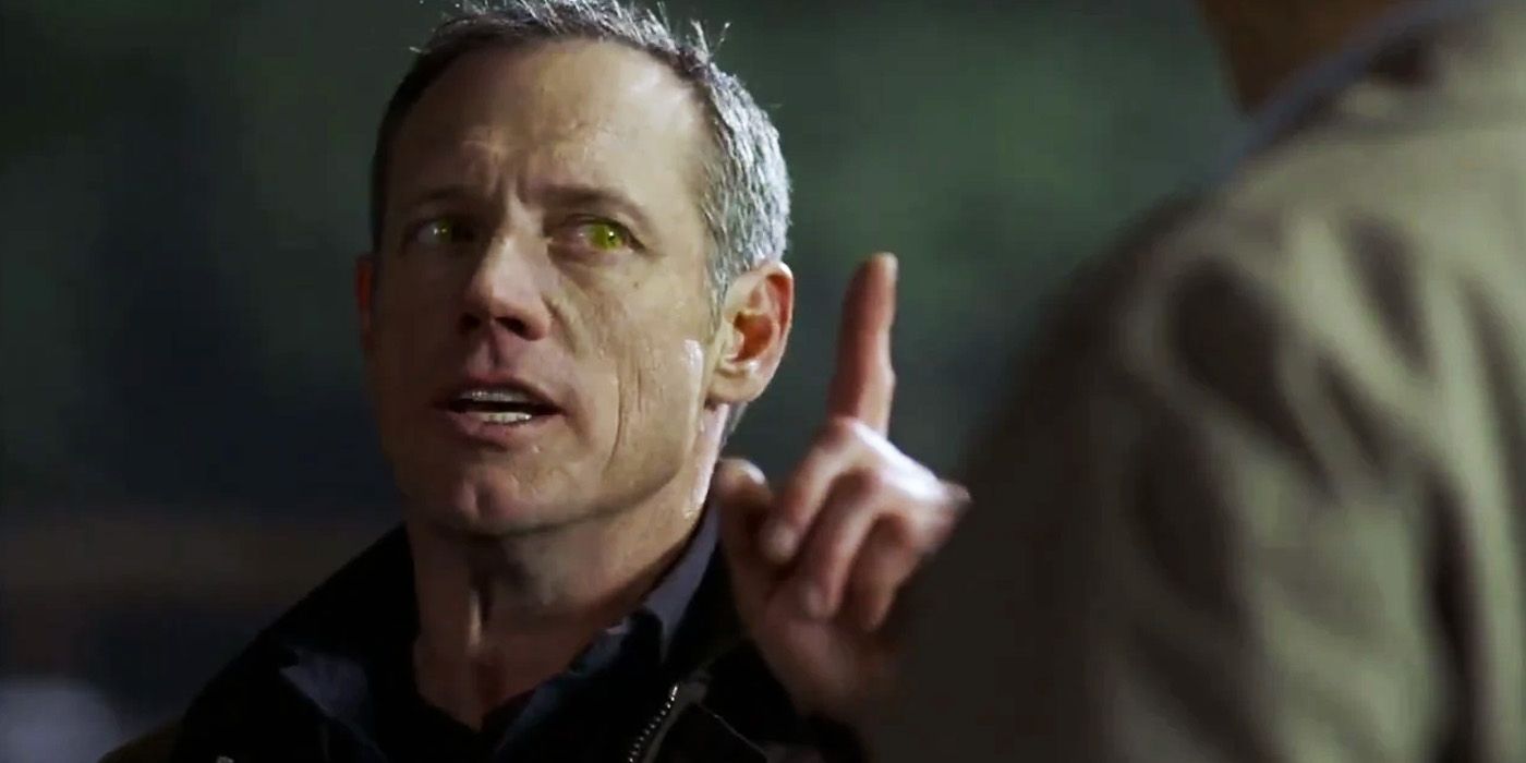 Azazel the yellow-eyed demon holding a finger up to Sam Winchester in Supernatural