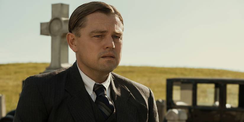 Ernest Burkhart cries in a cemetery in Killers of the Flower Moon