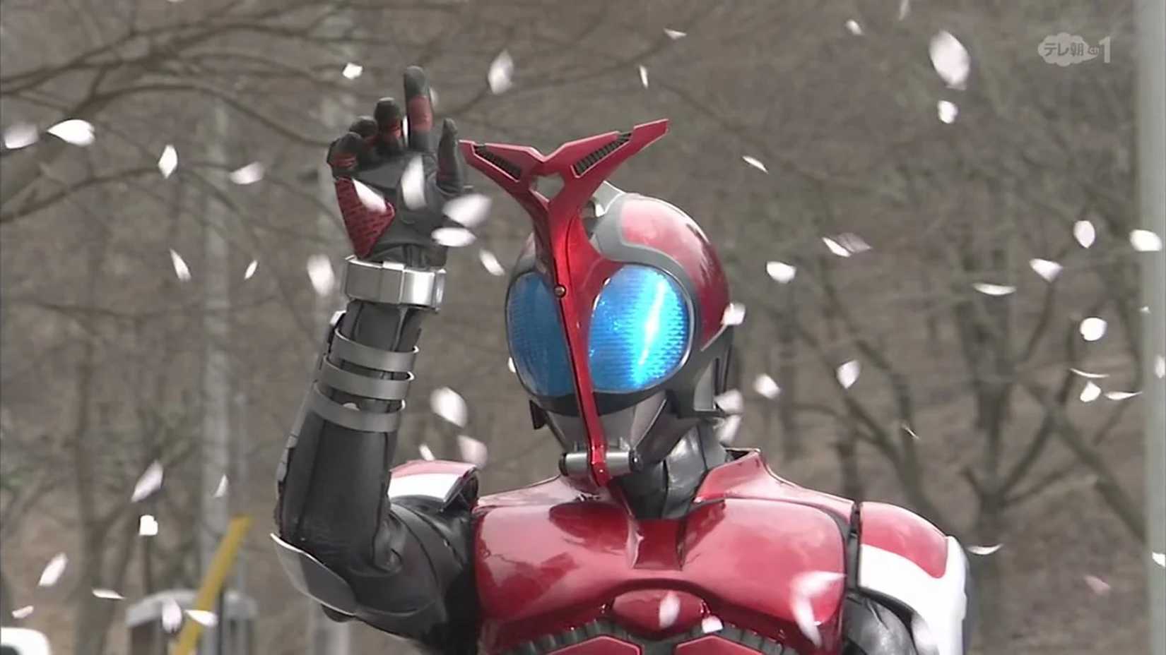 Kamen Rider Kabuto raising a finger in the air after a Rider Kick