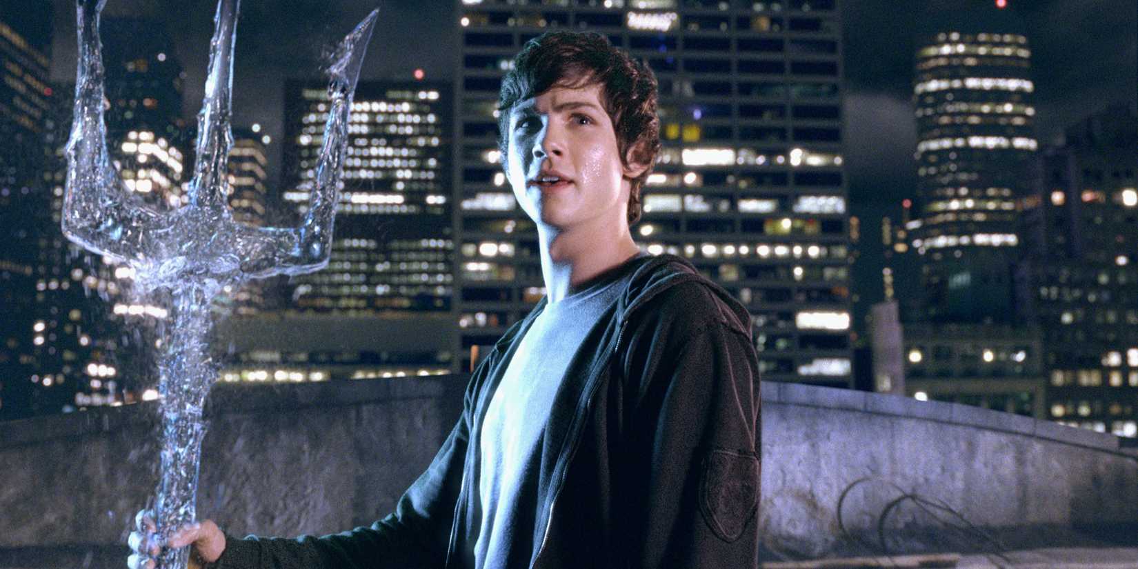 Percy Jackson holding trident in The Lightning Thief
