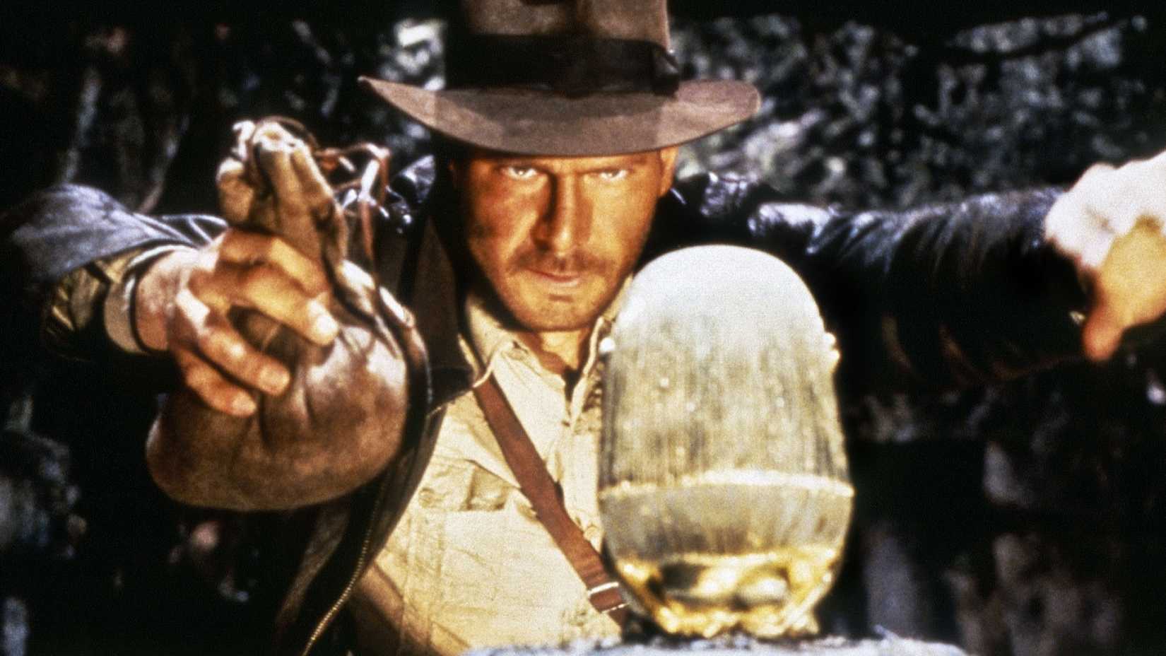 Indiana Jones (Harrison Ford) prepares to steal the idol in Raiders of the Lost Ark