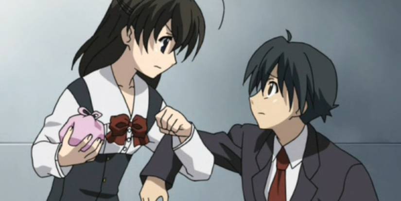 Sekai Saonji and Makoto Ito argue while linking arms in School Days.