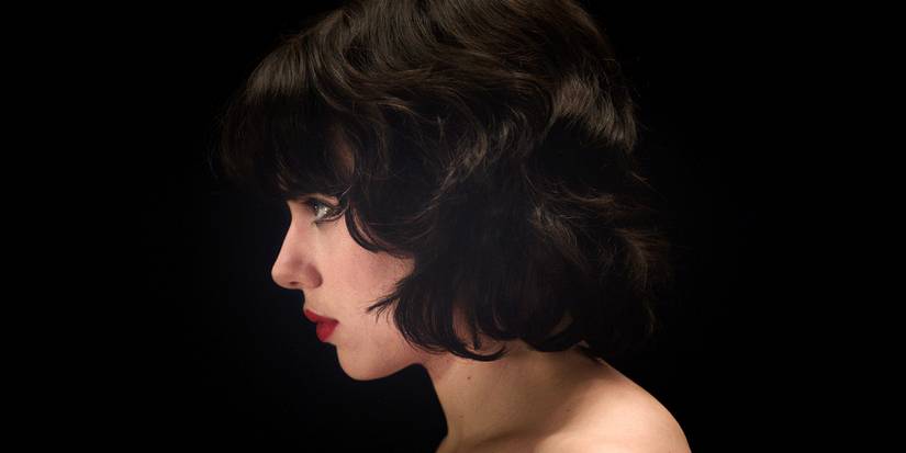 Scarlett Johansson's unnamed alien looks to the side in Under the Skin