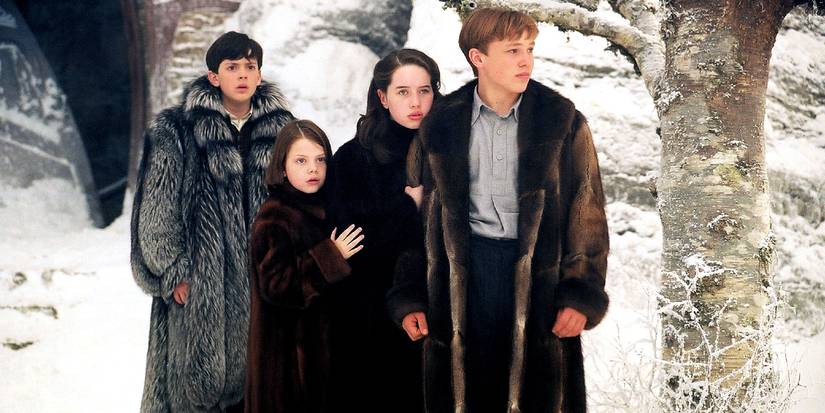 The children wear large fur coats in a snowy Narnia in THE CHRONICLES OF NARNIA: THE LION, THE WITCH AND THE WARDROBE