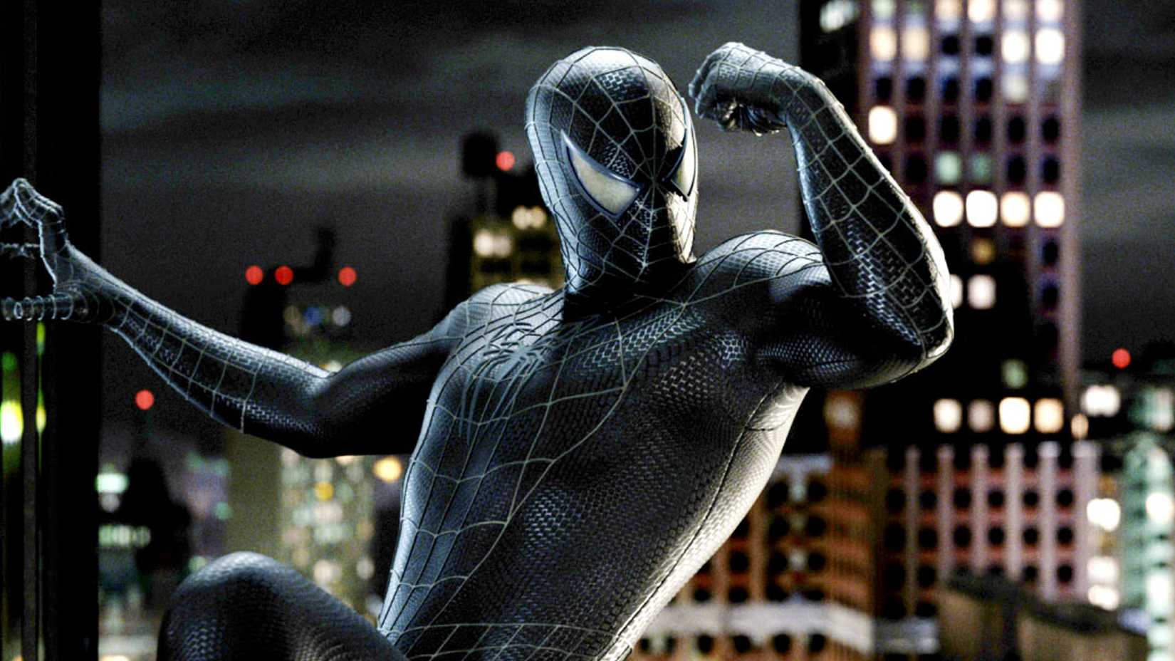 Tobey Maguire flexing in his Alien Costume from Spider-Man 3