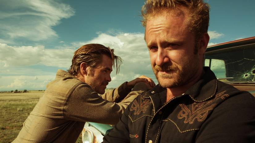 Toby and Tanner Howard by their truck in the desert