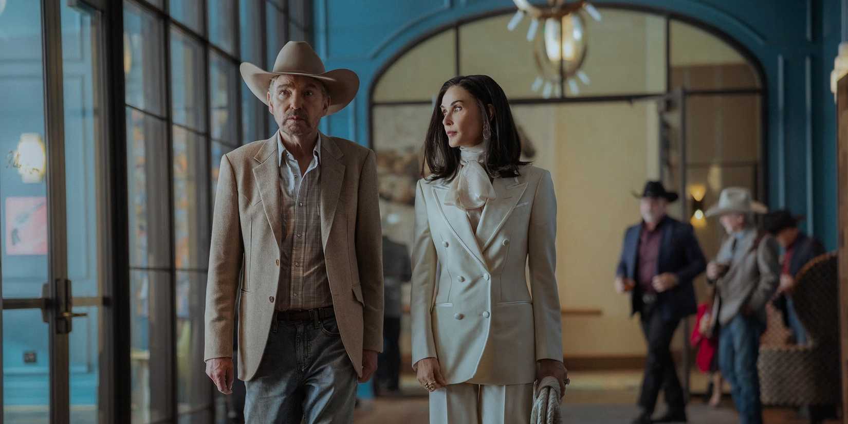 Billy Bob Thornton as Tommy Norris and Demi Moore as Cami Miller walking down the hallway in the premiere of Landman Season 2-1