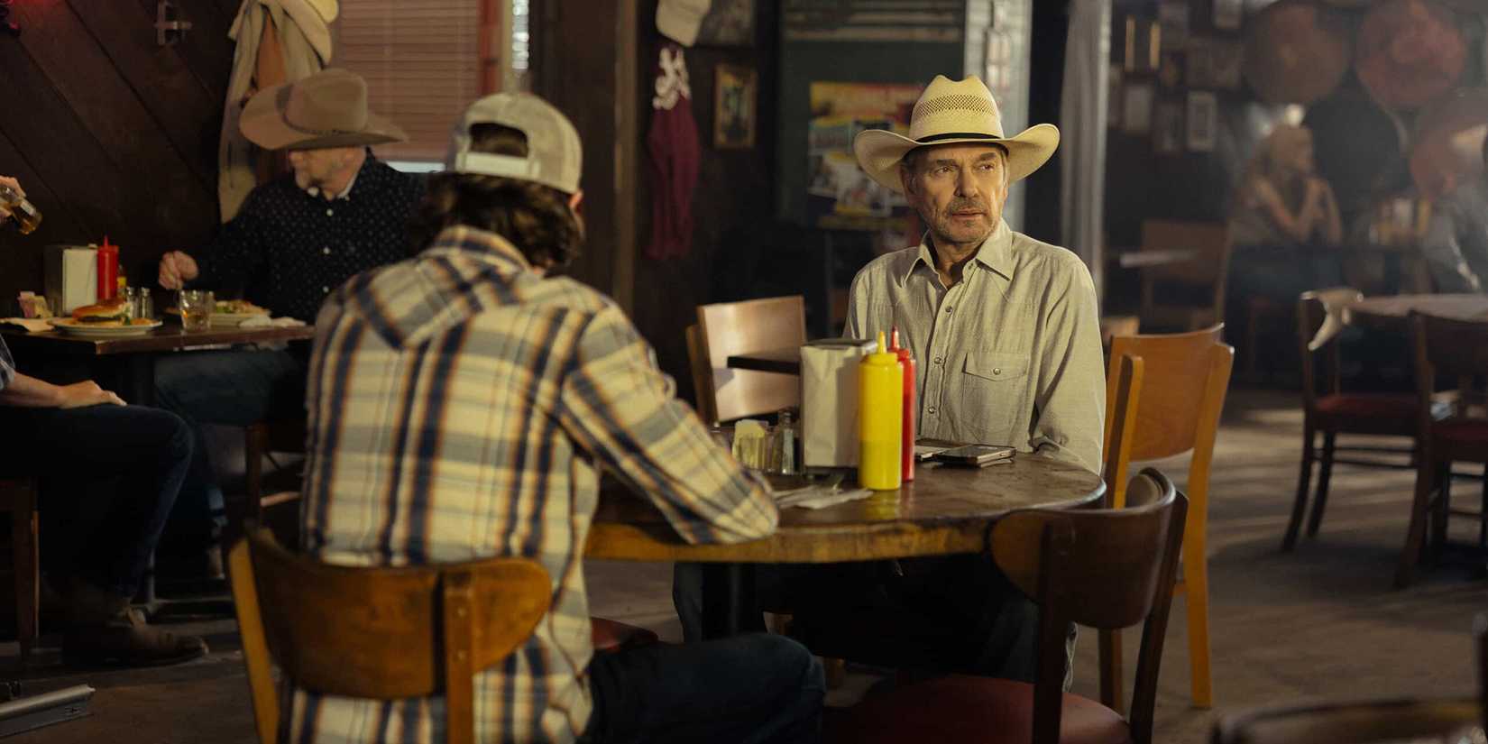 Billy Bob Thornton as Tommy Norris sits in the Patch Cafe with son Cooper Norris