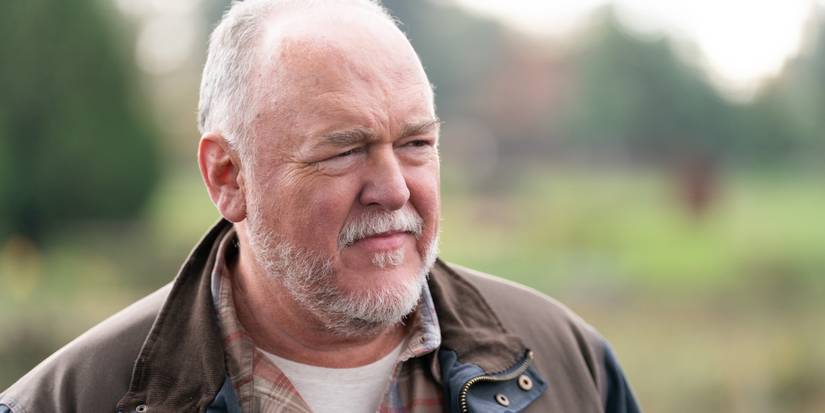 Brent Sexton as Keaton surveying the area in Tracker 'Good Trouble'