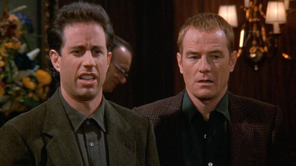 Jerry makes a face while standing next to his dentist (Bryan Cranston) in Seinfeld