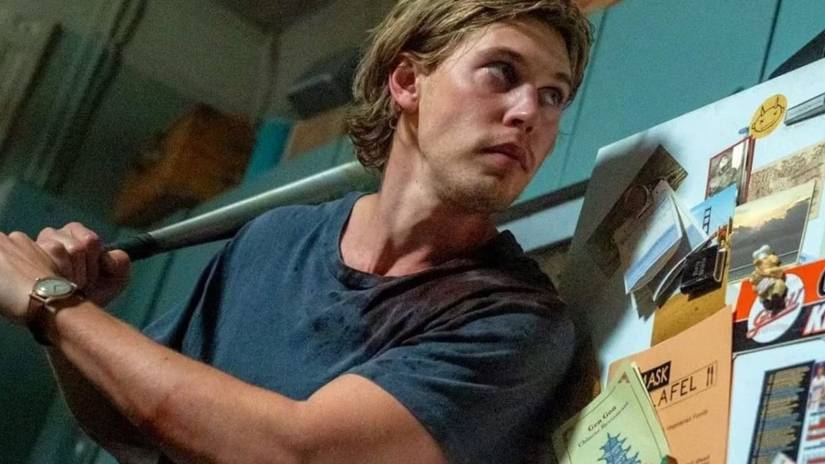 Austin Butler preparing to swing a baseball bat in Caught Stealing