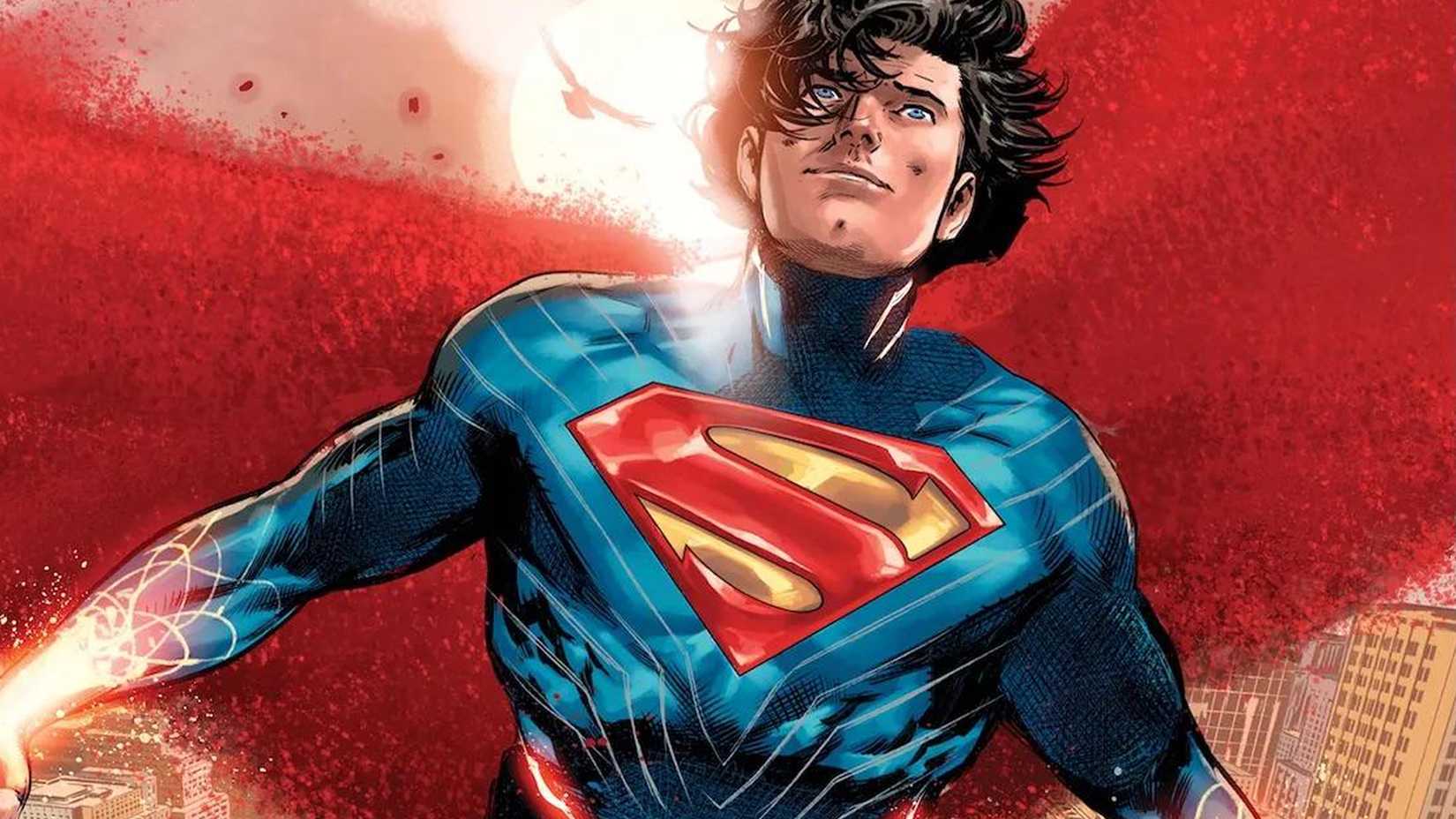 Absolute Superman flying above a city