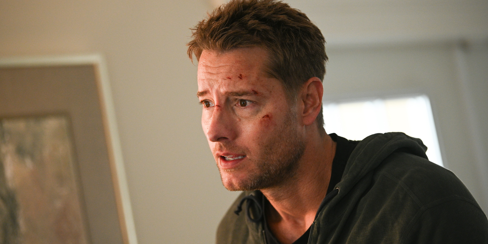 Justin Hartley as Colter Shaw, injured and worried in Tracker 'The Fallout'