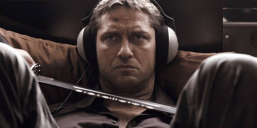 Uno-Dos frunciendo el ceño con los auriculares puestos