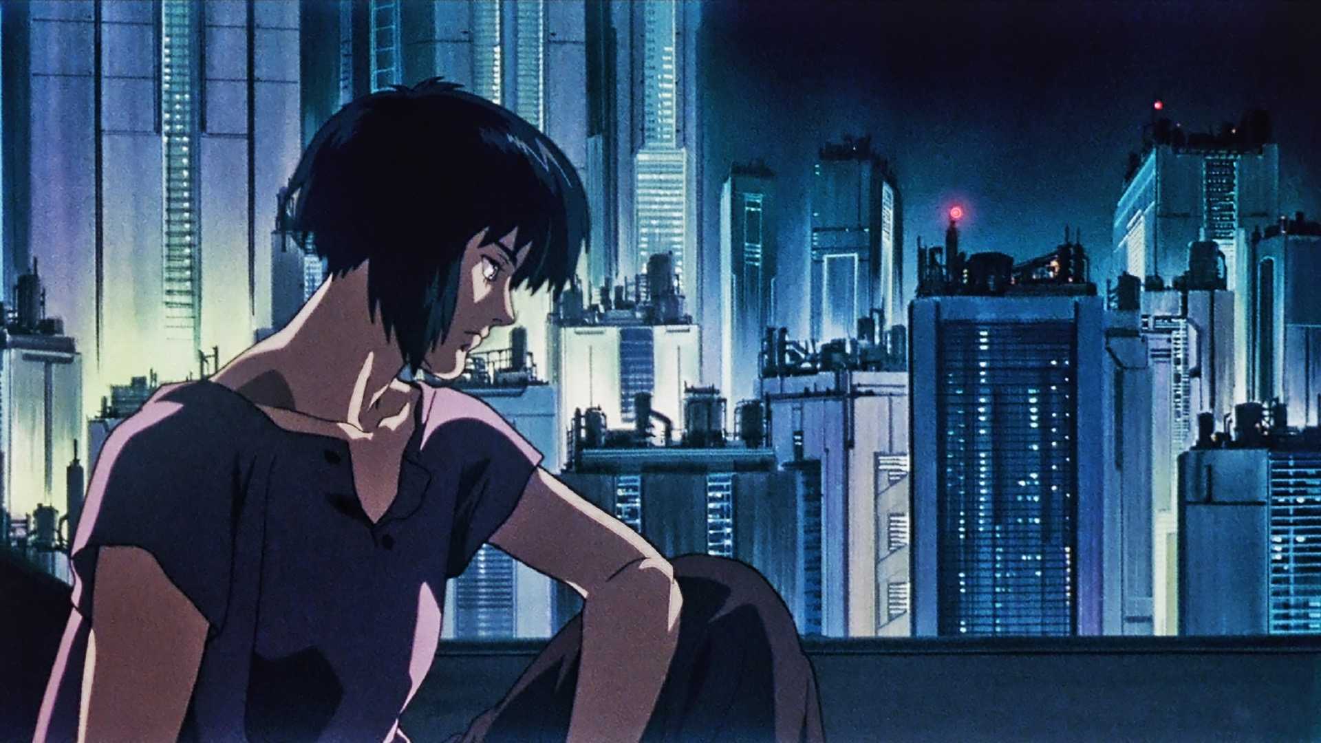 The cyborg Motoko looks pensive against a cyberpunk skyline in Ghost in the Shell.