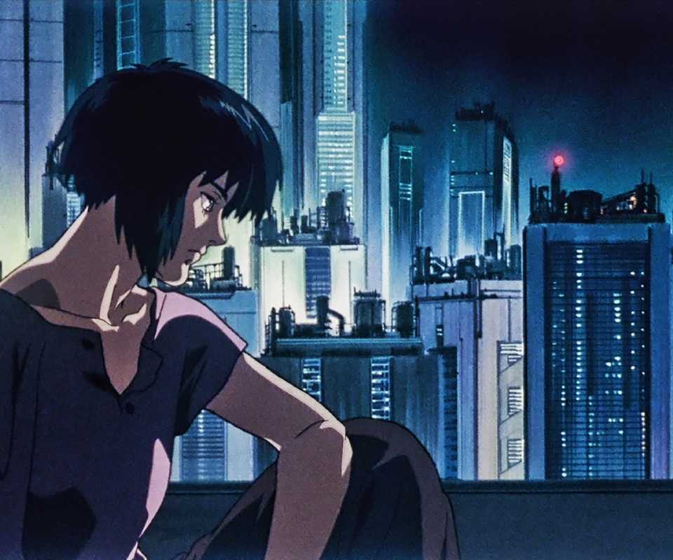 The cyborg Motoko looks pensive against a cyberpunk skyline in Ghost in the Shell.