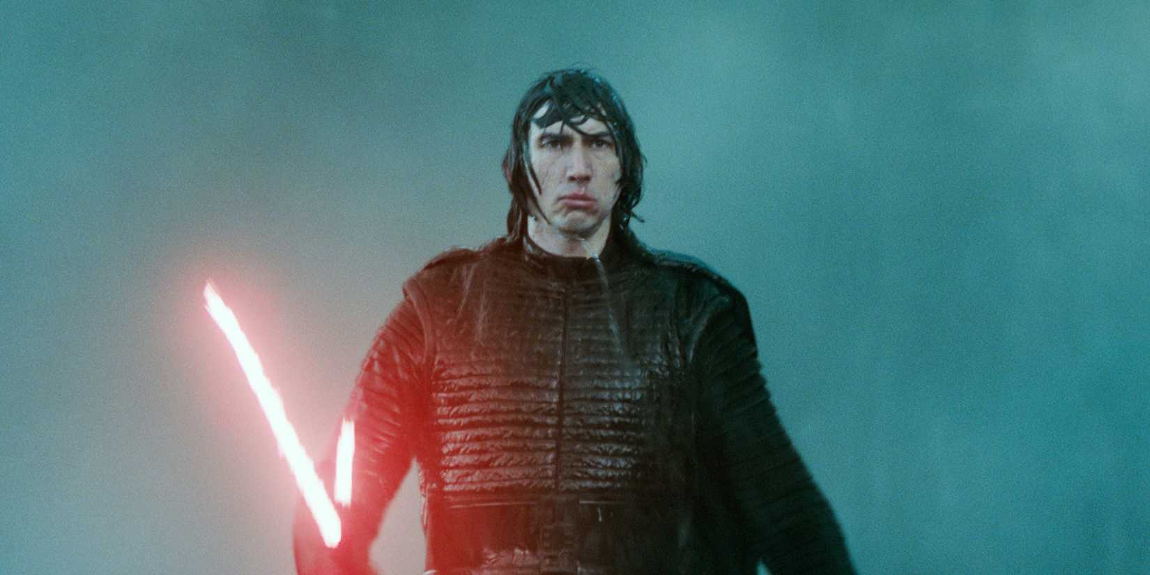 Kylo Ren (Adam Driver) emerges from the rain in Star Wars -- The Rise of Skywalker