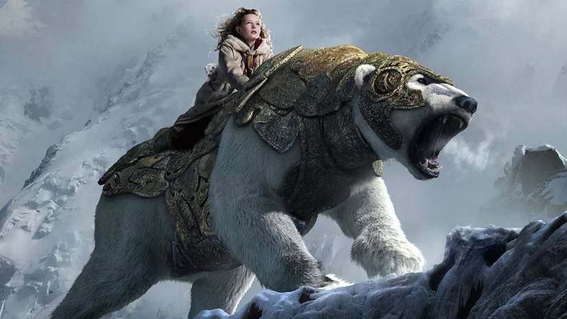 Lyra rides on the back of Iorek the polar bear in the Arctic