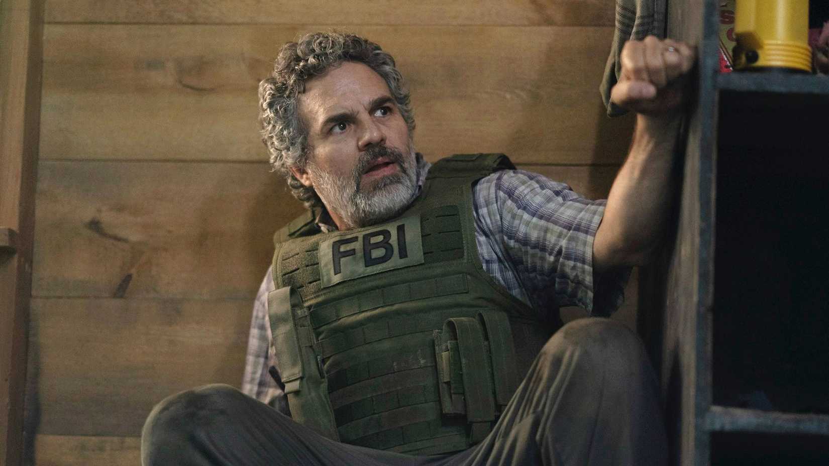 Mark Ruffalo crouches in an FBI vest from Task