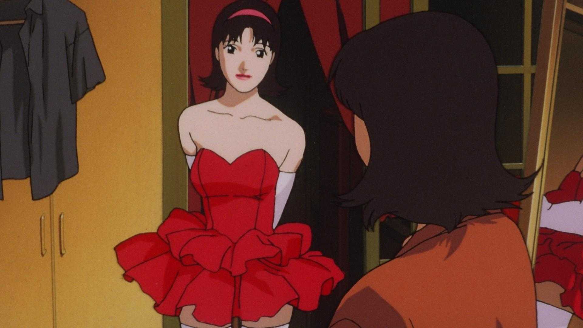 Pop idol Mima Kirigoe stands in a red dress in Perfect Blue